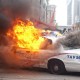 Protesters smash police vehicles in the